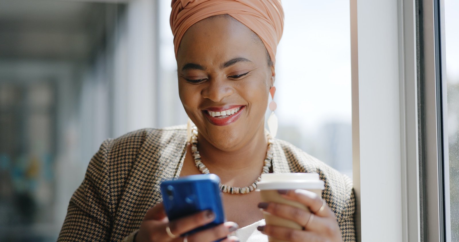 Business, black woman and smartphone for typing, social media and connection in office. Female entr